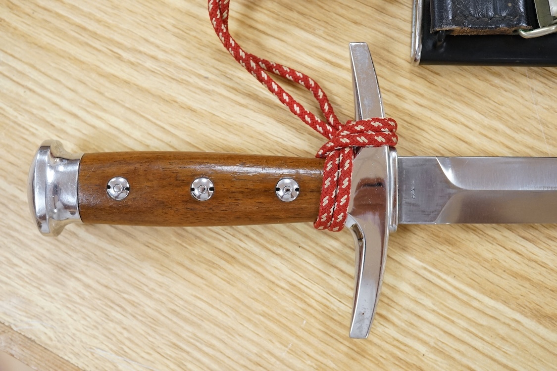 A post 1943 Swiss Army dagger, with knot and scabbard